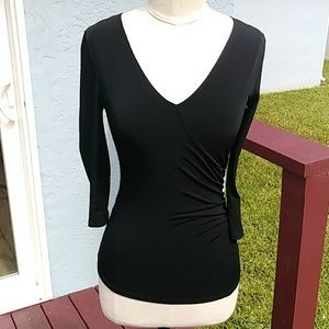 Parallel women's pullover top.